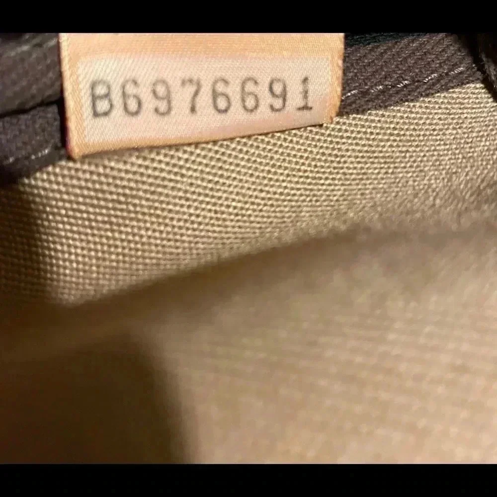 Dooney & Bourke beige brown canvas leather bag